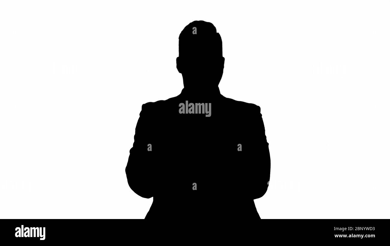 Silhouette uomo d'affari pensando ai suoi piani futuri. Sognare. Foto Stock