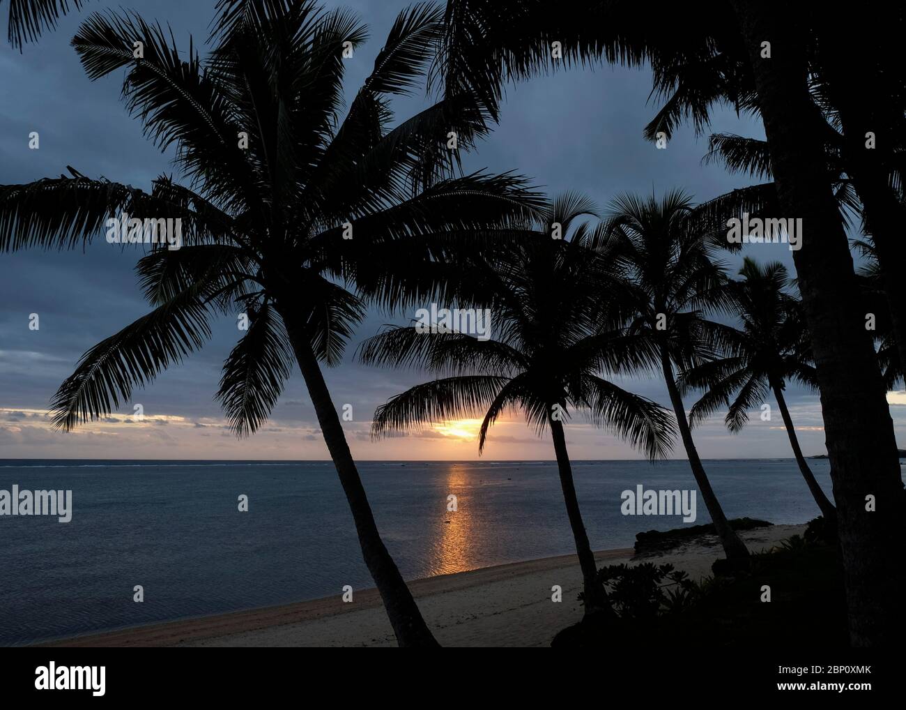 Tramonto a Bedarra Beach, Korotogo, Coral Coast, viti Levu, Fiji, Sud Pacifico. Foto Stock