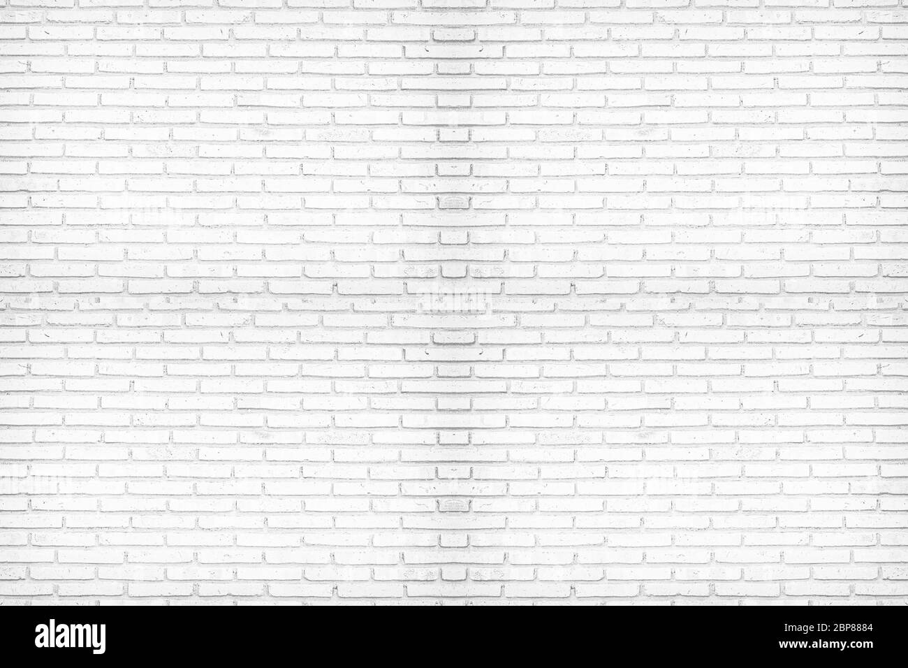 Abstract weathered texture colorate vecchio stucco grigio chiaro. In mattoni bianchi sullo sfondo di parete nella sala rurale. Texture di sfondo orizzontale. Foto Stock