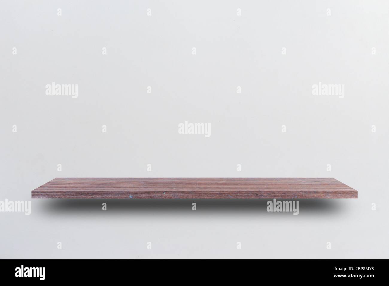 Vista frontale ripiano vuoto in legno e parete grigia. Concetto di design Foto Stock