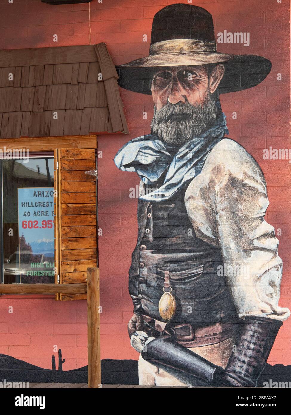 Pittura di parete esterna di un cowboy. Foto Stock