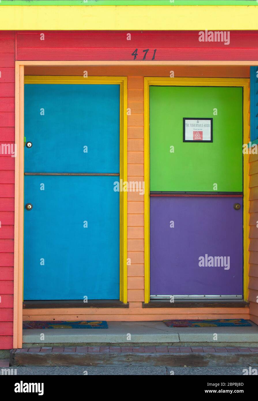 Casa e porte multicolore Foto Stock