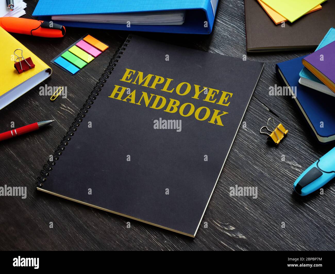 Manuale e documenti per i dipendenti con regole e procedure. Foto Stock