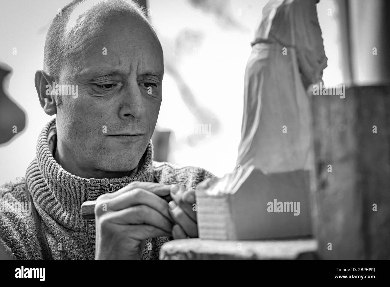Italia Alto Adige - Dolomiti - Val Gardena - Ortisei - GIUSEPPE STUFLESSER scultura in legno Foto Stock