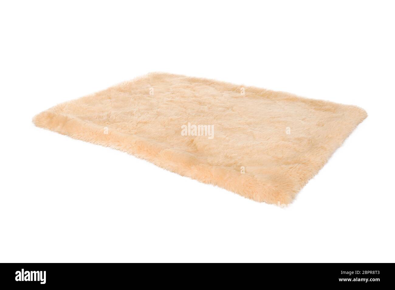 Tappeto in pelliccia beige. Isolato su bianco Foto Stock