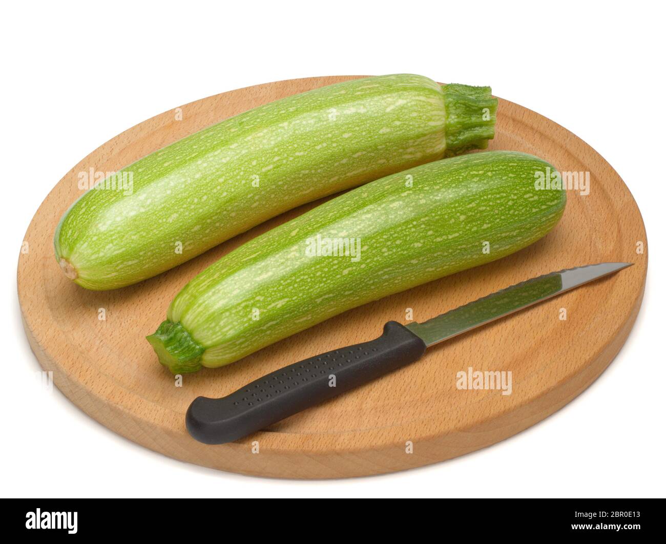 Zucca, verdure marrows, zucchine su una tavola di legno isolata su sfondo bianco Foto Stock