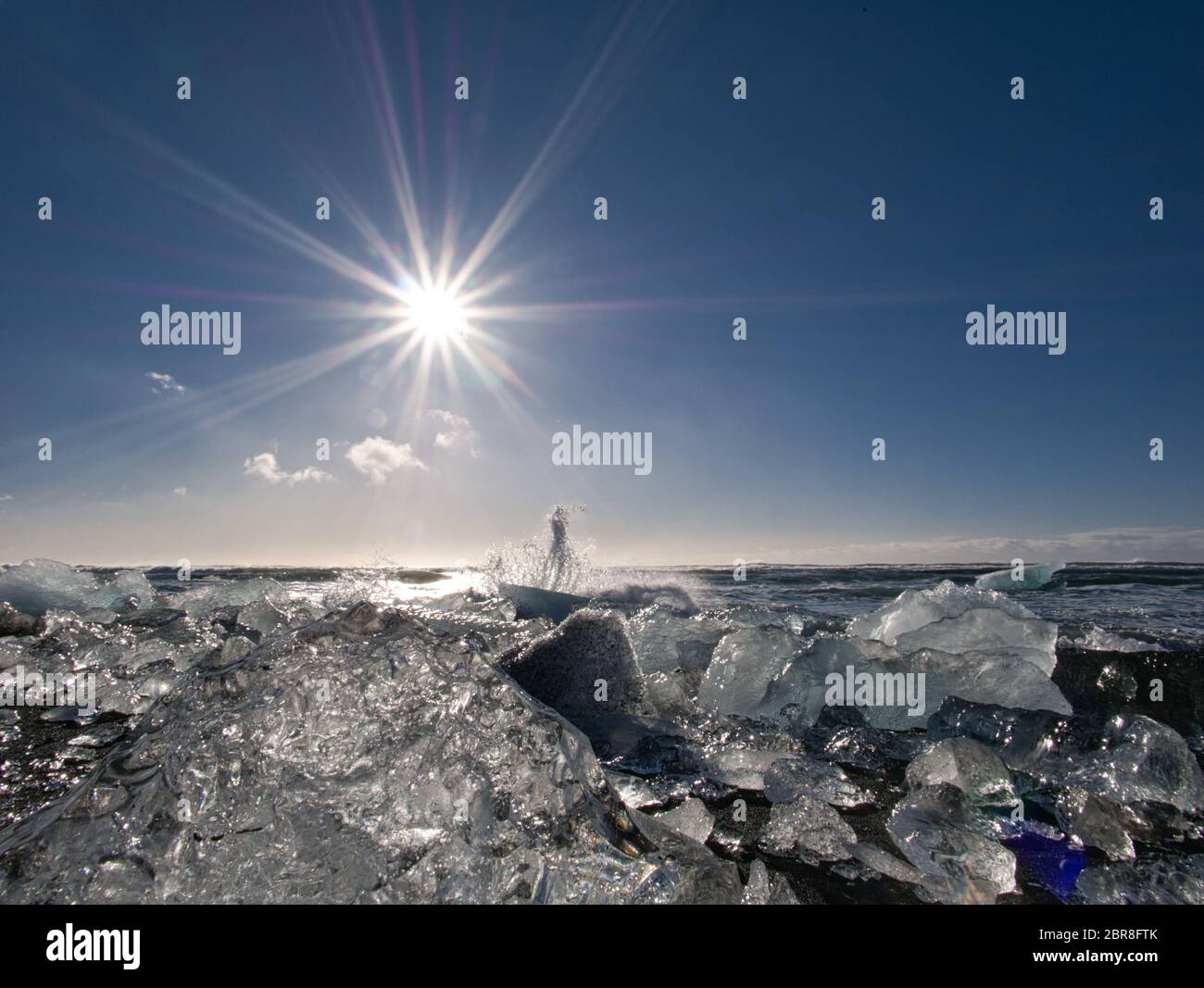 Il ghiacciaio sul litorale della spiaggia di diamante con bassa sun Foto Stock