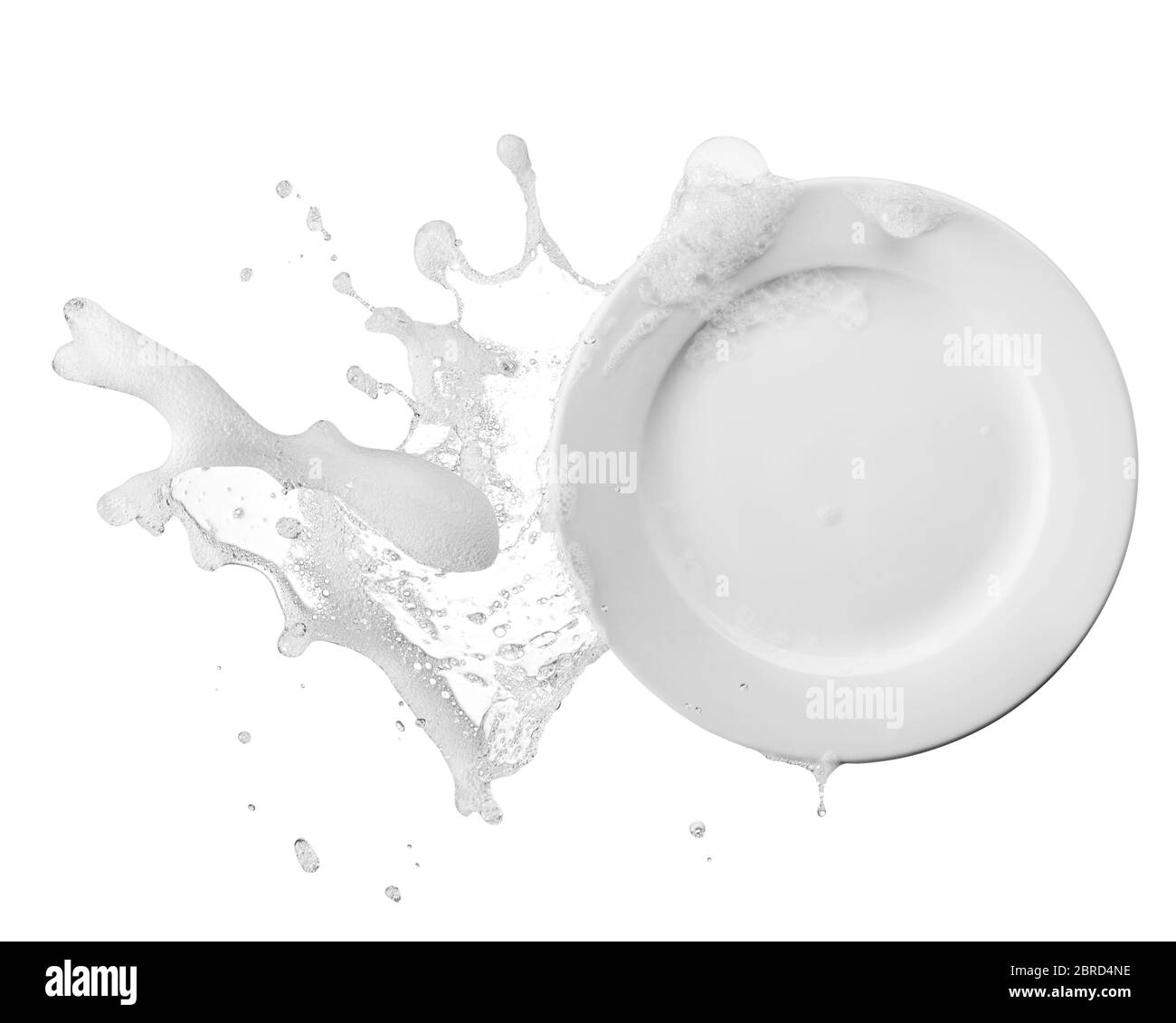 acqua contenente sapone e bolle spruzzate sulla piastra Foto Stock