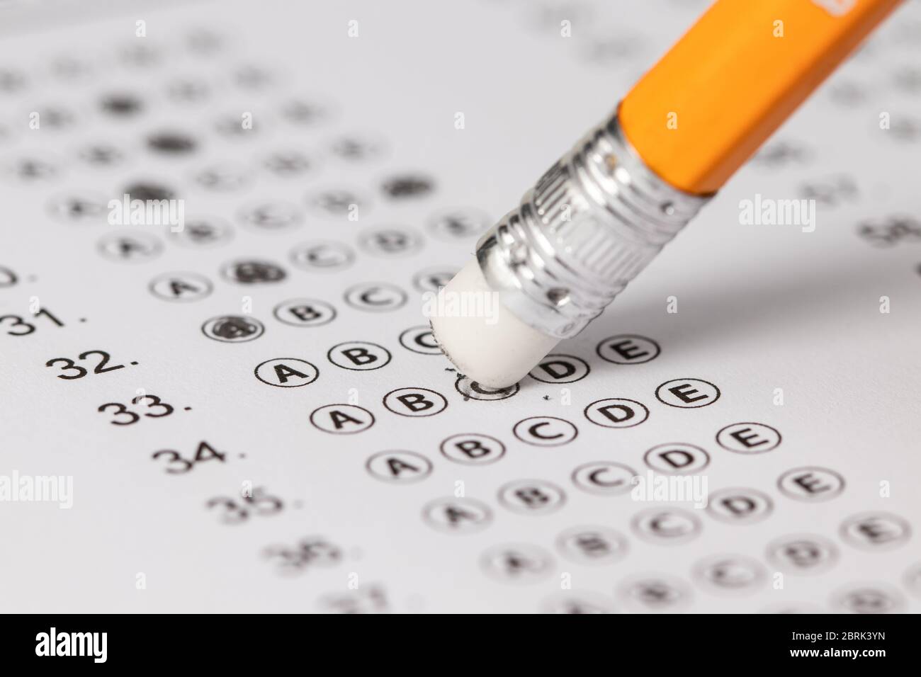 written mistake on a piece of paper, delete, correct, and mistake concept. Take the exam, write the exam. Foto Stock