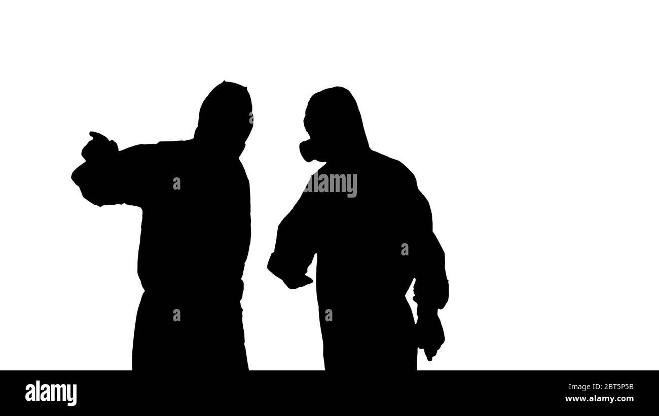 Il team Silhouette Disinfection è chiamato ad aiutare. Foto Stock