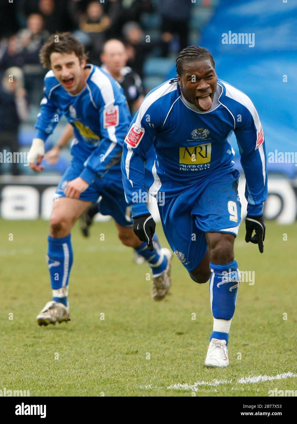 LONDRA, UK MARZO 29: Aaron Mclean di Peterborough segna e celebra l'obiettivo di apertura durante la Coca Cola League Two tra Peterborough United v Foto Stock