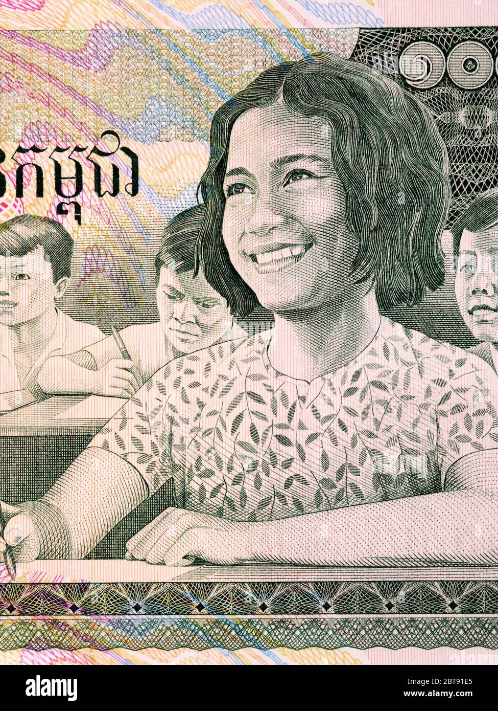 Studenti della scuola con denaro cambogiano Foto Stock