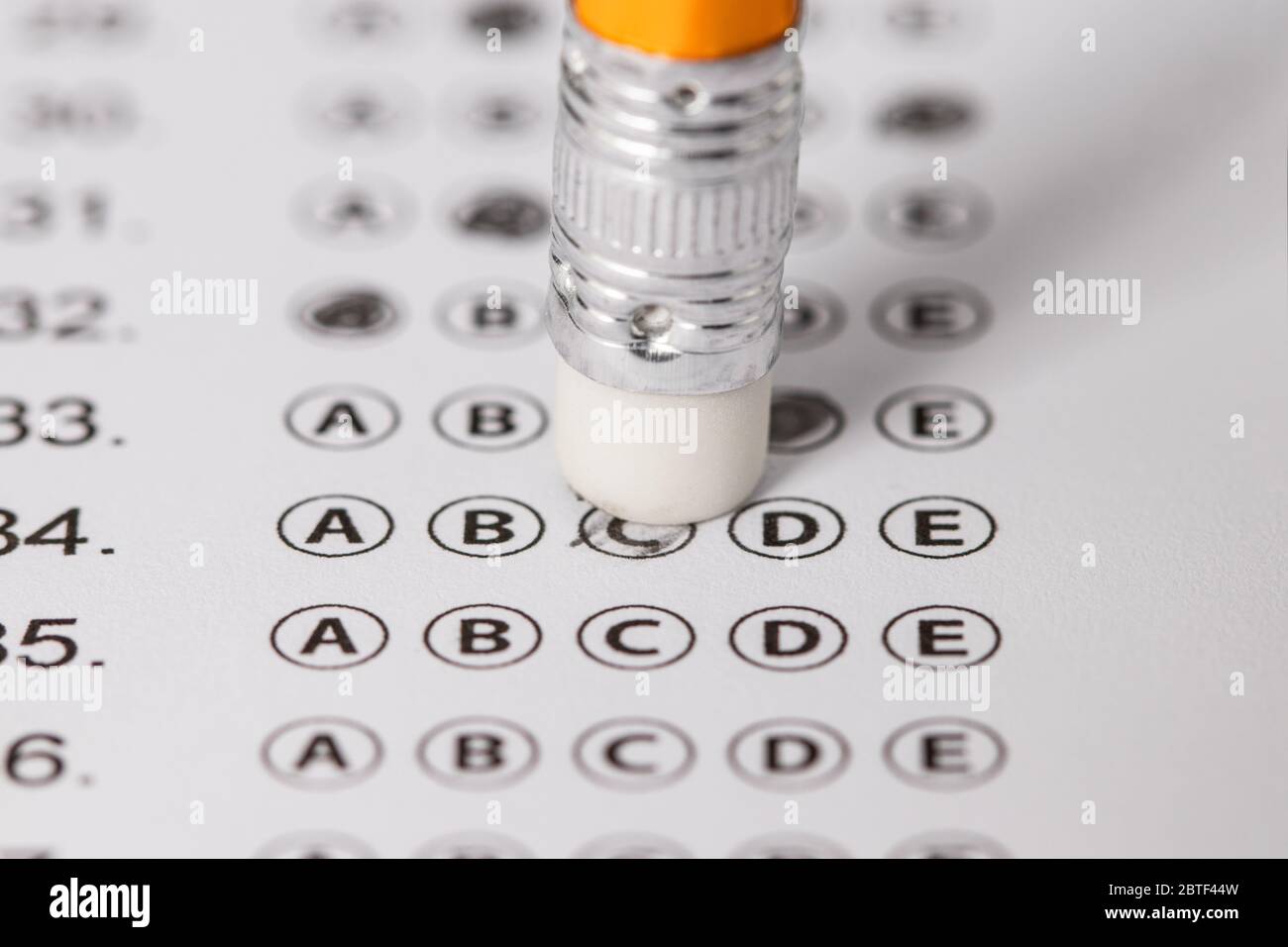 written mistake on a piece of paper, delete, correct, and mistake concept. Take the exam, write the exam. Foto Stock