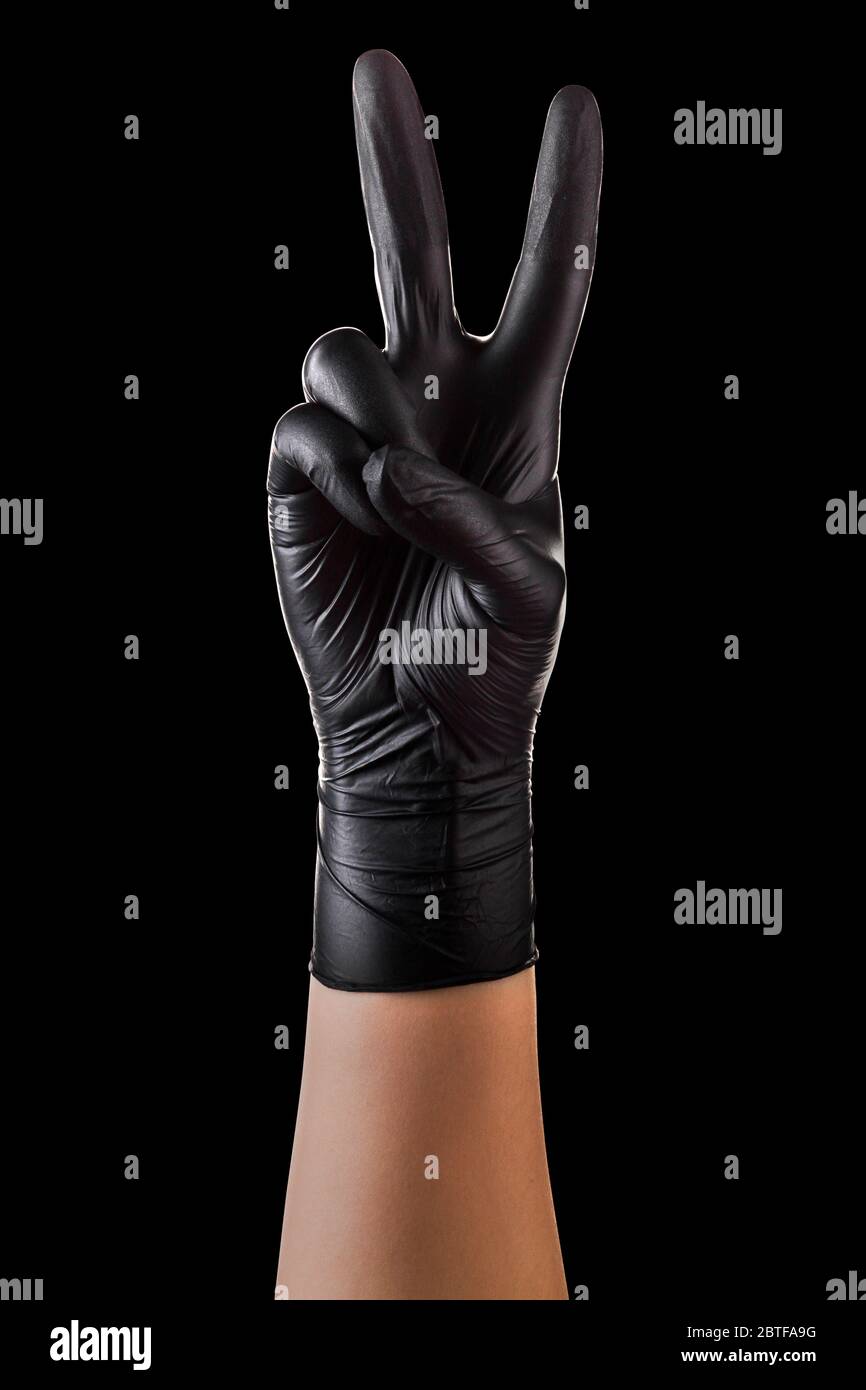 Guanti neri con due dita in pace o simbolo della vittoria in nero Foto  stock - Alamy