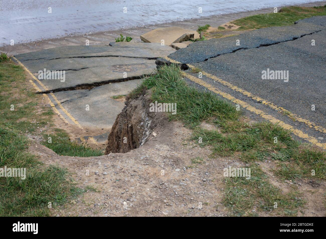 Fine della strada a Aldborough East Yorkshire Coast, erosione costiera Regno Unito Foto Stock