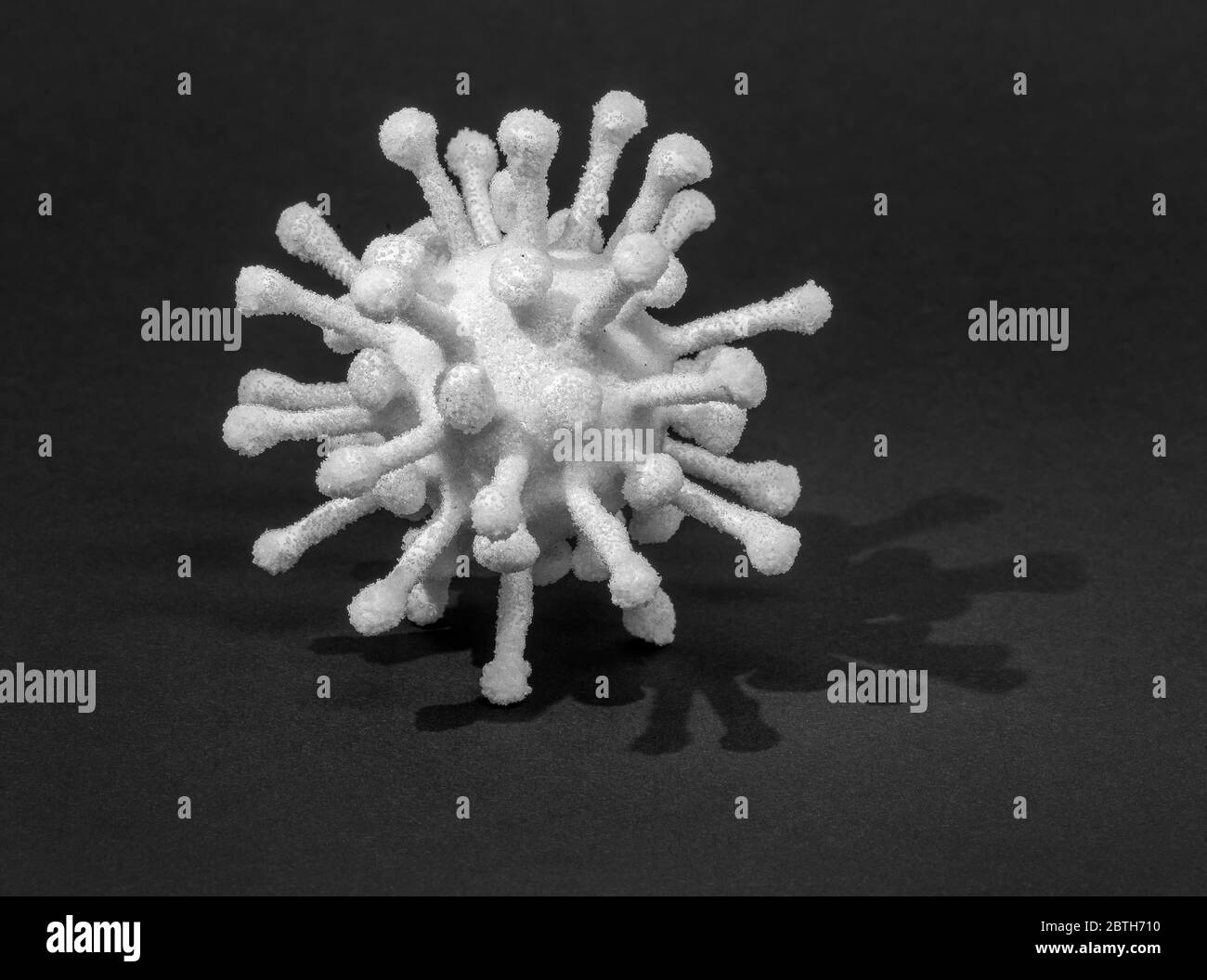 immagine di un virus simbolico in nero Foto Stock