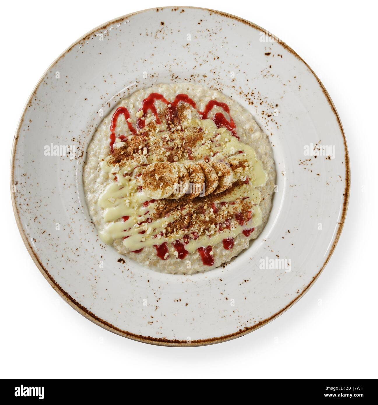 farinata d'avena con banana, miele e noci per colazione, vista dall'alto isolata Foto Stock