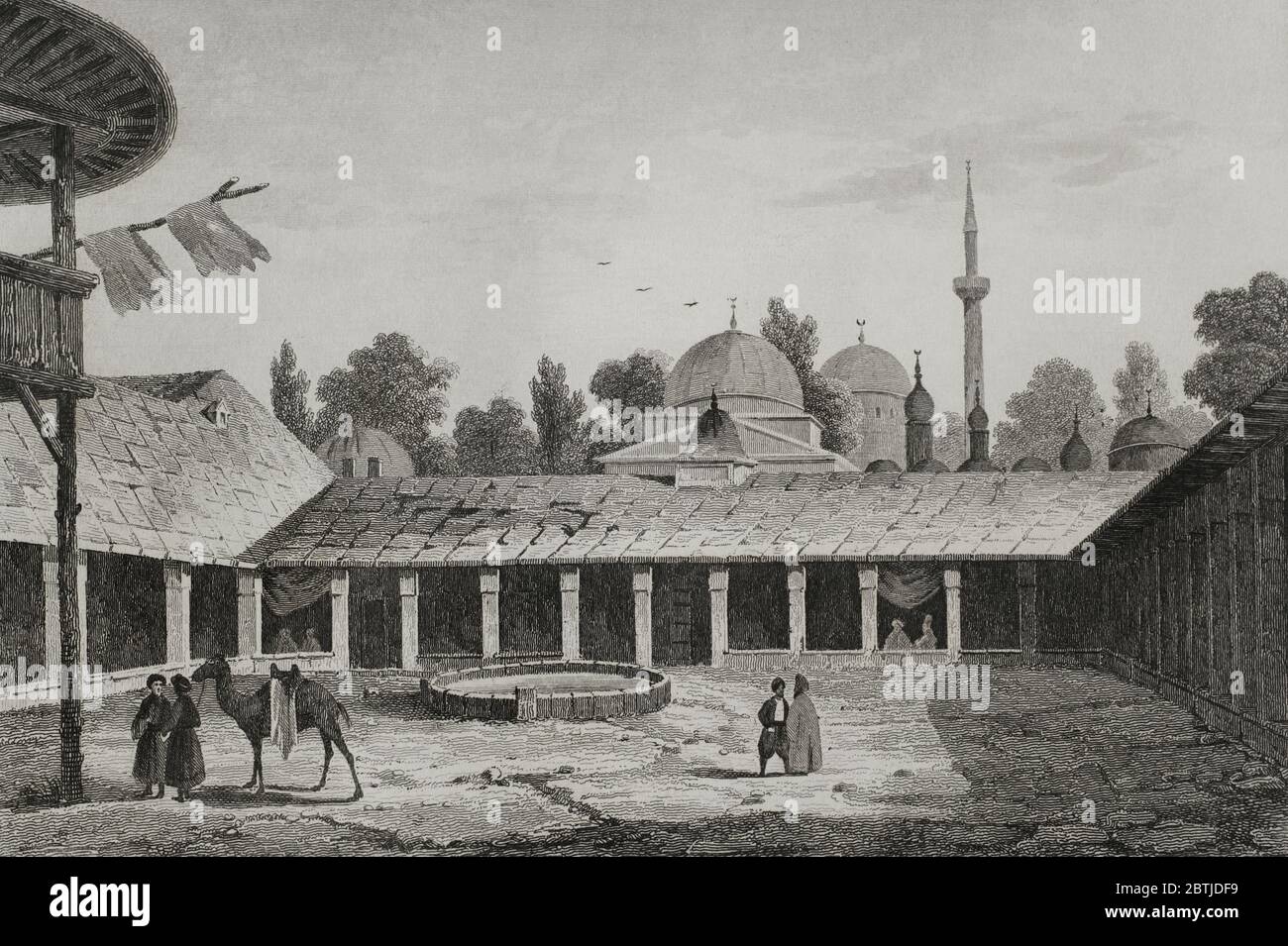 Periodo dell'Impero Ottomano. Caravanserai a Burgas (oggi territorio della Bulgaria). Cortile del Caravanserai, luogo di riposo per i viaggiatori. Incisione di Lemaitre, Vormser e Cholet. Historia de Turquia di Joseph Marie Jouannin (1783-1844) e Jules Van Gaver, 1840. Foto Stock