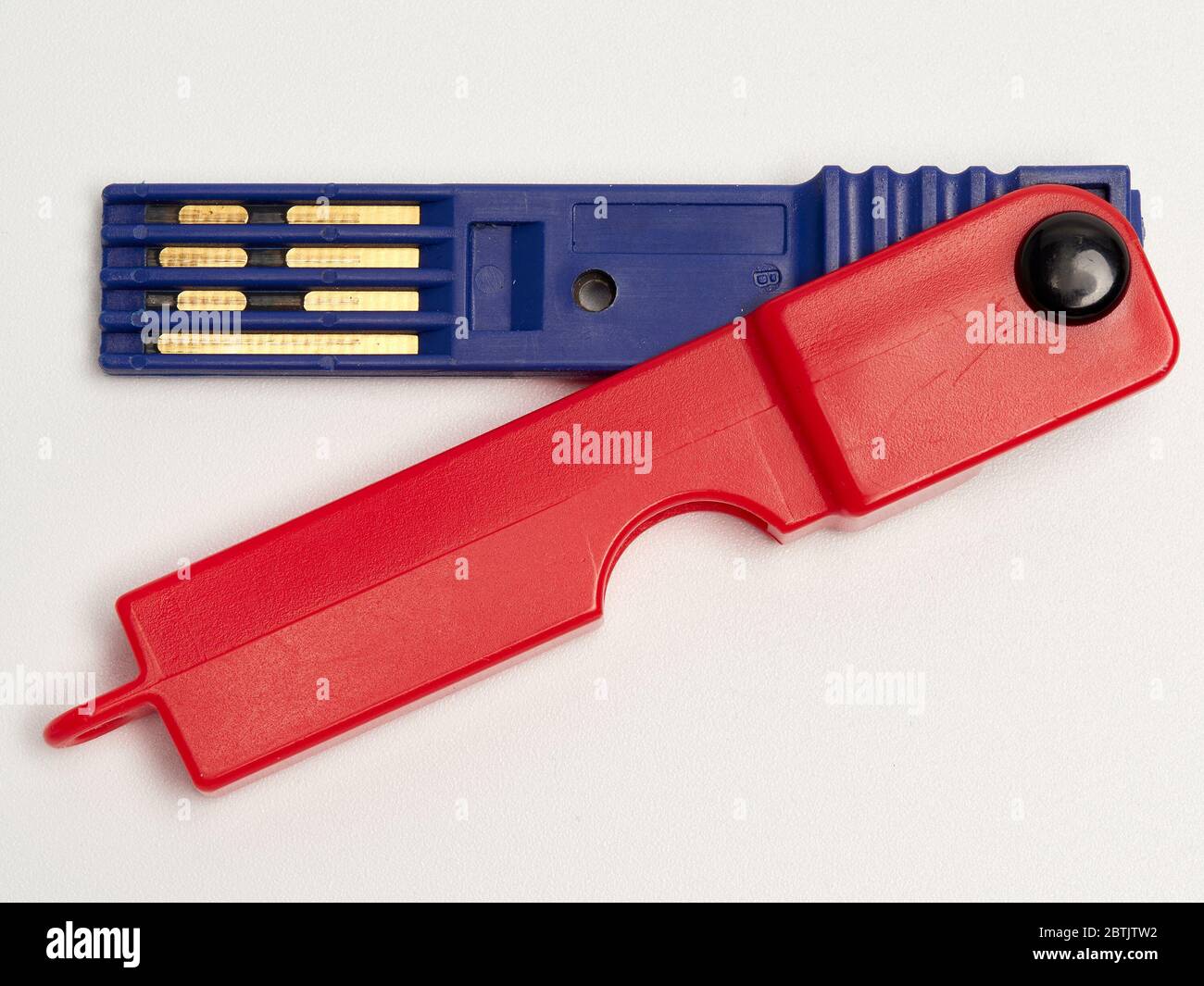 Chiave del contatore del prepagamento, rossa e blu. Foto Stock