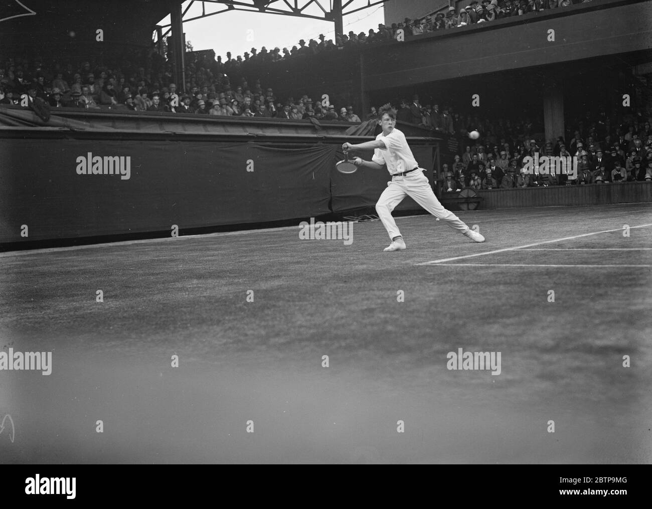 Tennis in prato a Wimbledon . C Boussus ( Francia ) in Gioca 24 giugno 1927 Foto Stock