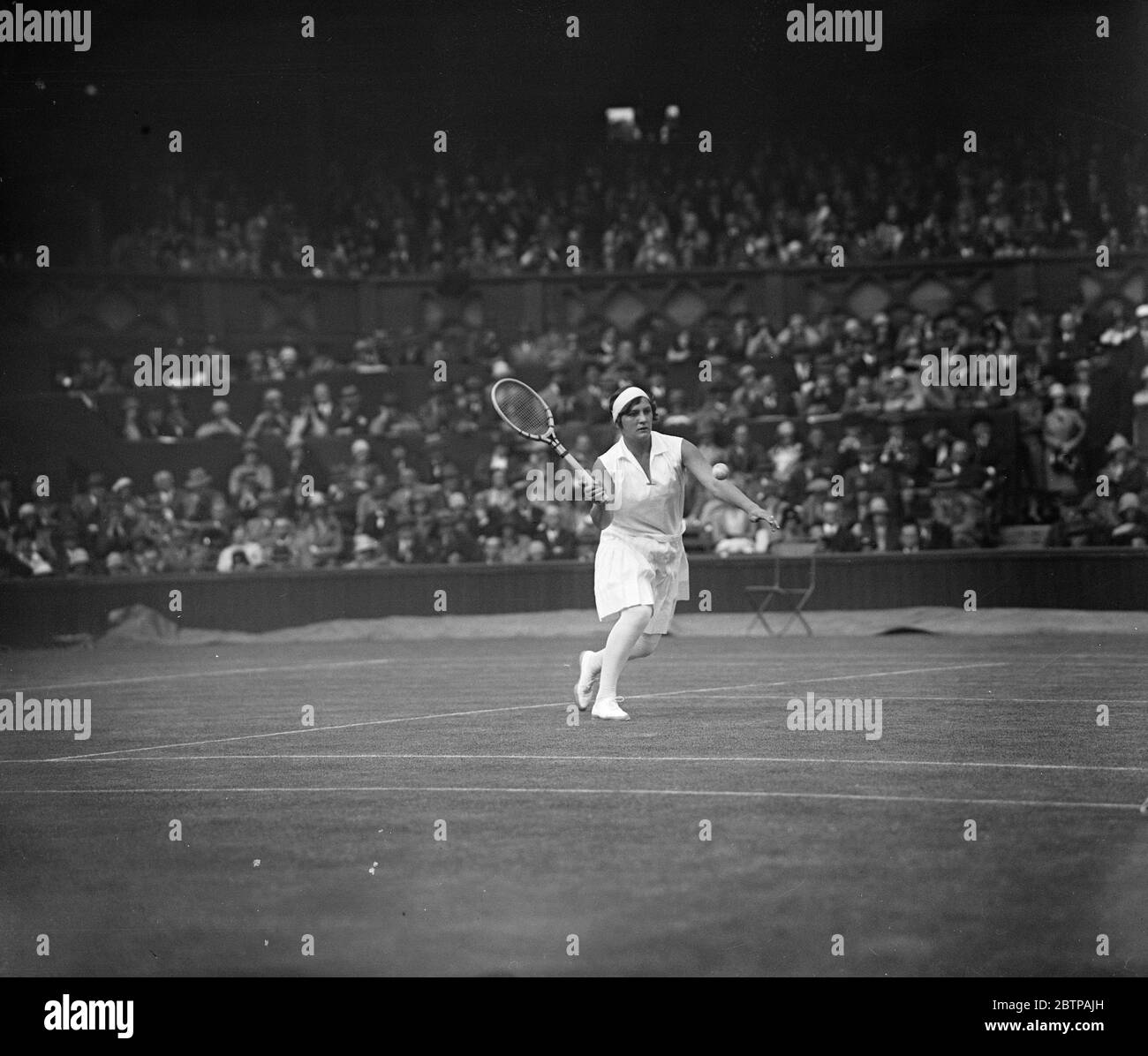 Tennis in prato a Wimbledon . Sig.na Jacobs . 16 giugno 1928 Foto Stock