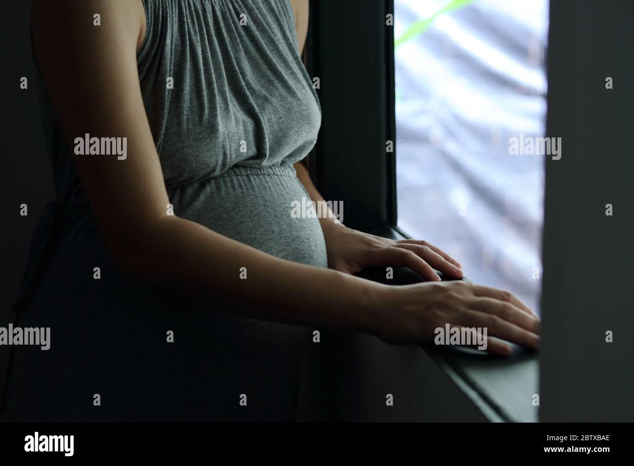 Gravidanza e mamma singola Foto Stock