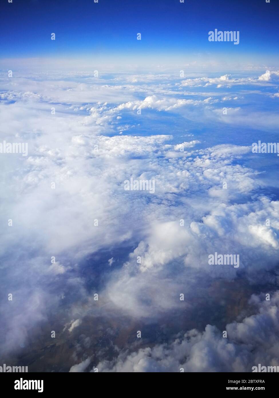 Formazioni di nuvole fotografate dall'alto da un aereo Foto Stock