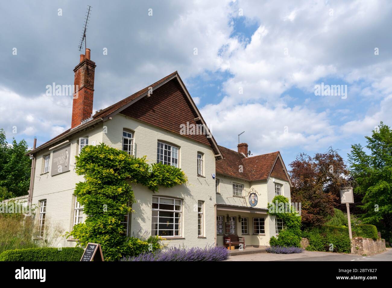 La casa pubblica Thomas Lord, West Mean, Hampshire, Inghilterra, Regno Unito Foto Stock