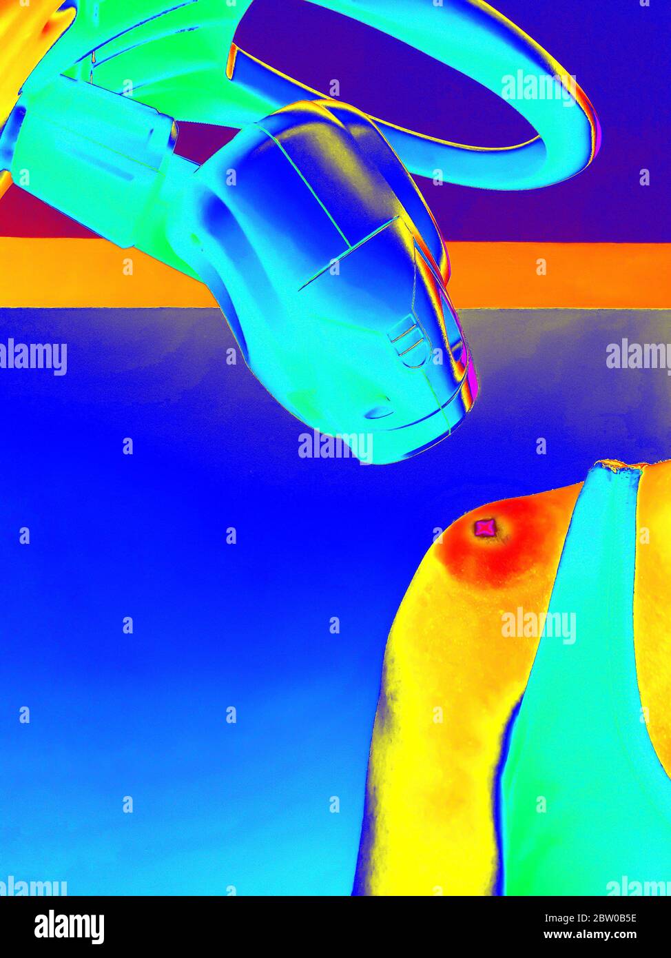 Immagine termica della terapia fisica con un laser per il trattamento di una spalla ferita Foto Stock