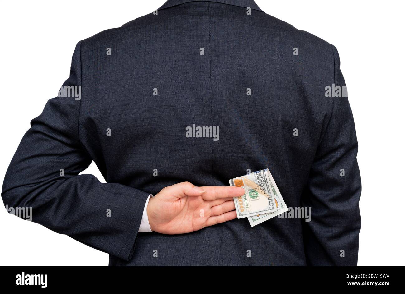Un uomo d’affari che tiene in mano dollari americani. Foto Stock