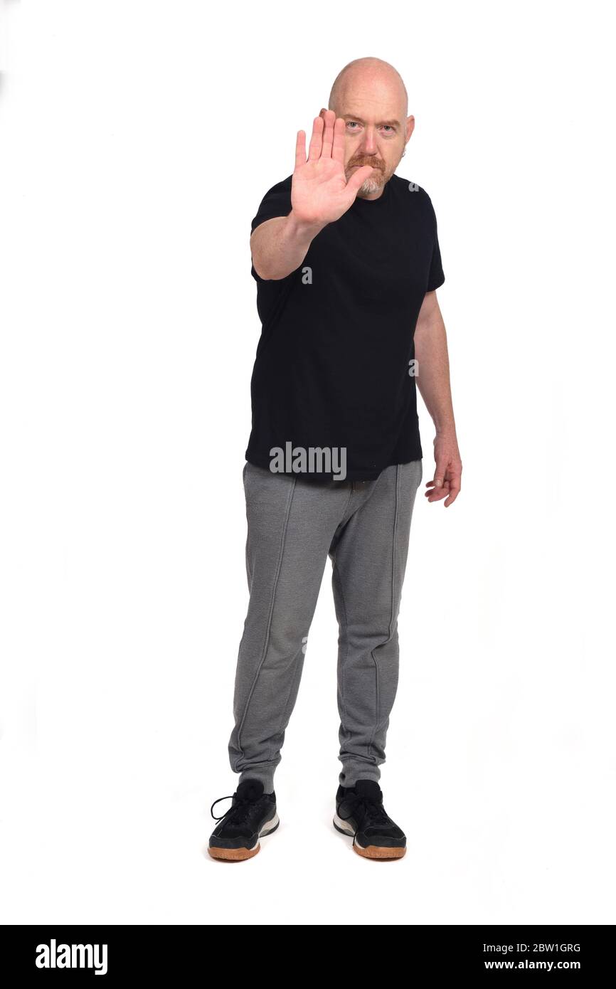 uomo con abbigliamento sportivo con spot su sfondo bianco Foto Stock