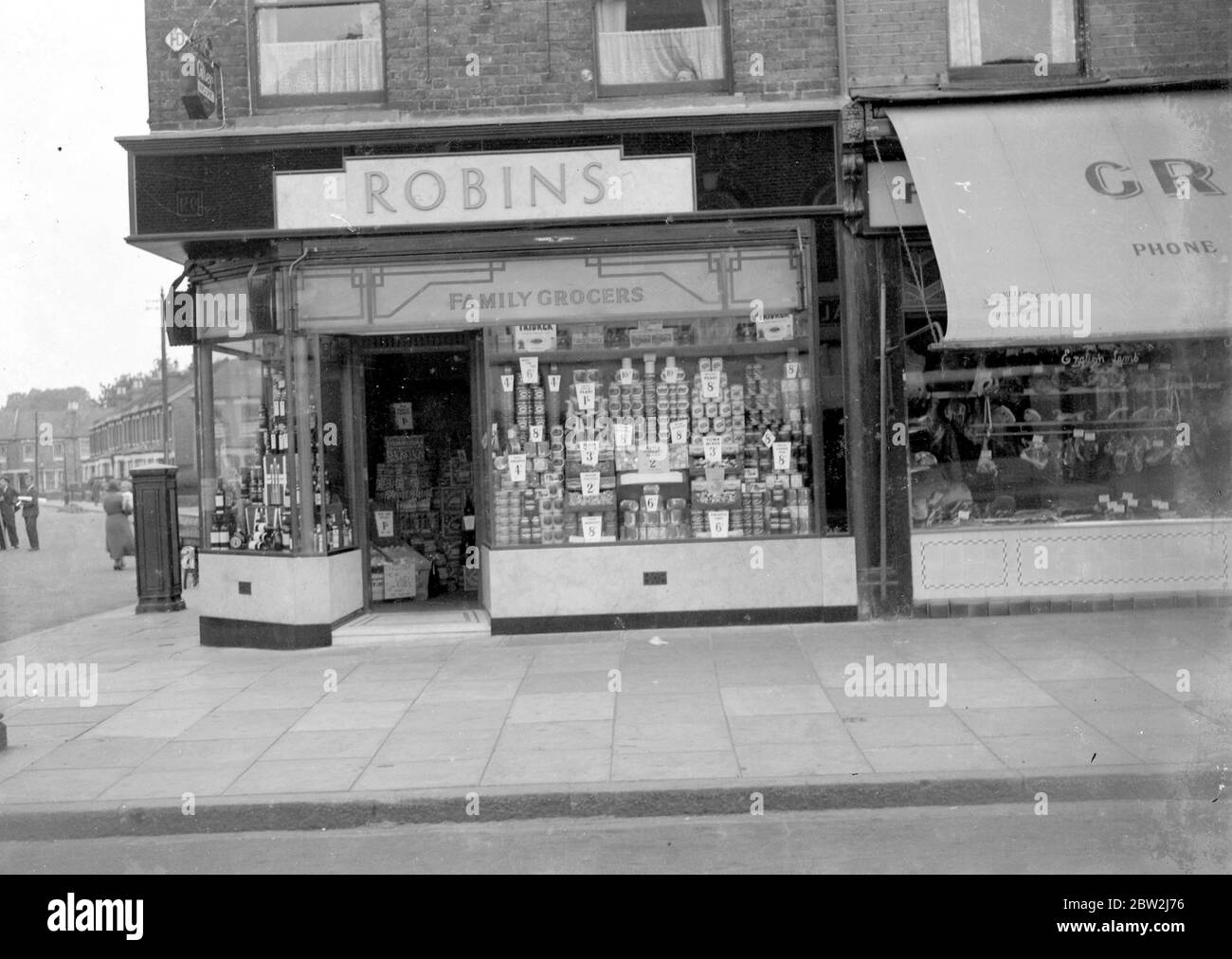 Negozio di alimentari della famiglia Robins a North Eltham, Kent. 1934 Foto Stock