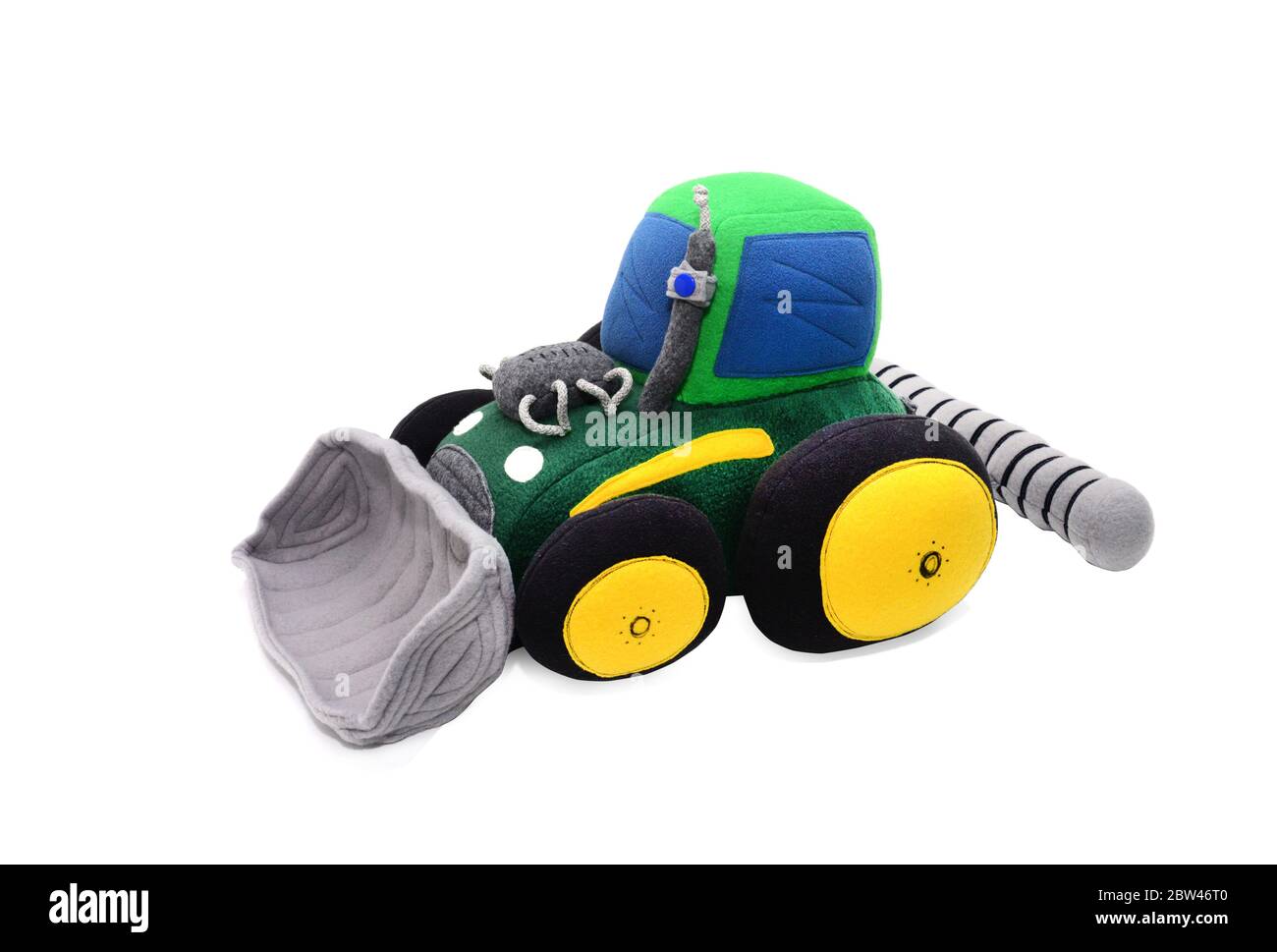 giocattolo verde imbottito su sfondo bianco Foto Stock