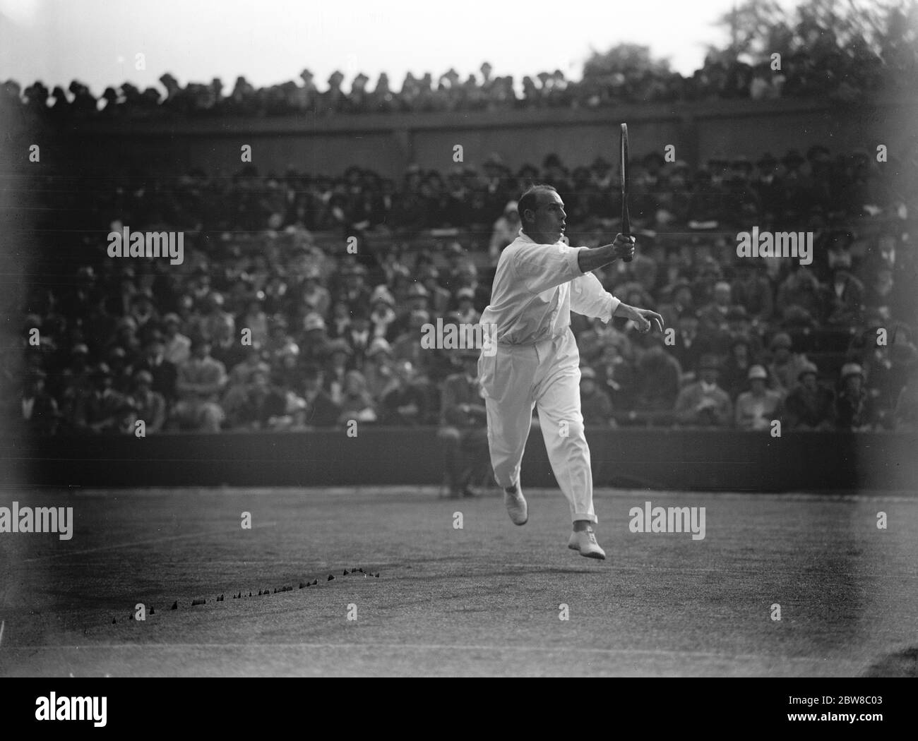 Campionati di tennis su prato a Wimbledon . Turnbull in gioco contro Borotra . 24 giugno 1925 Foto Stock