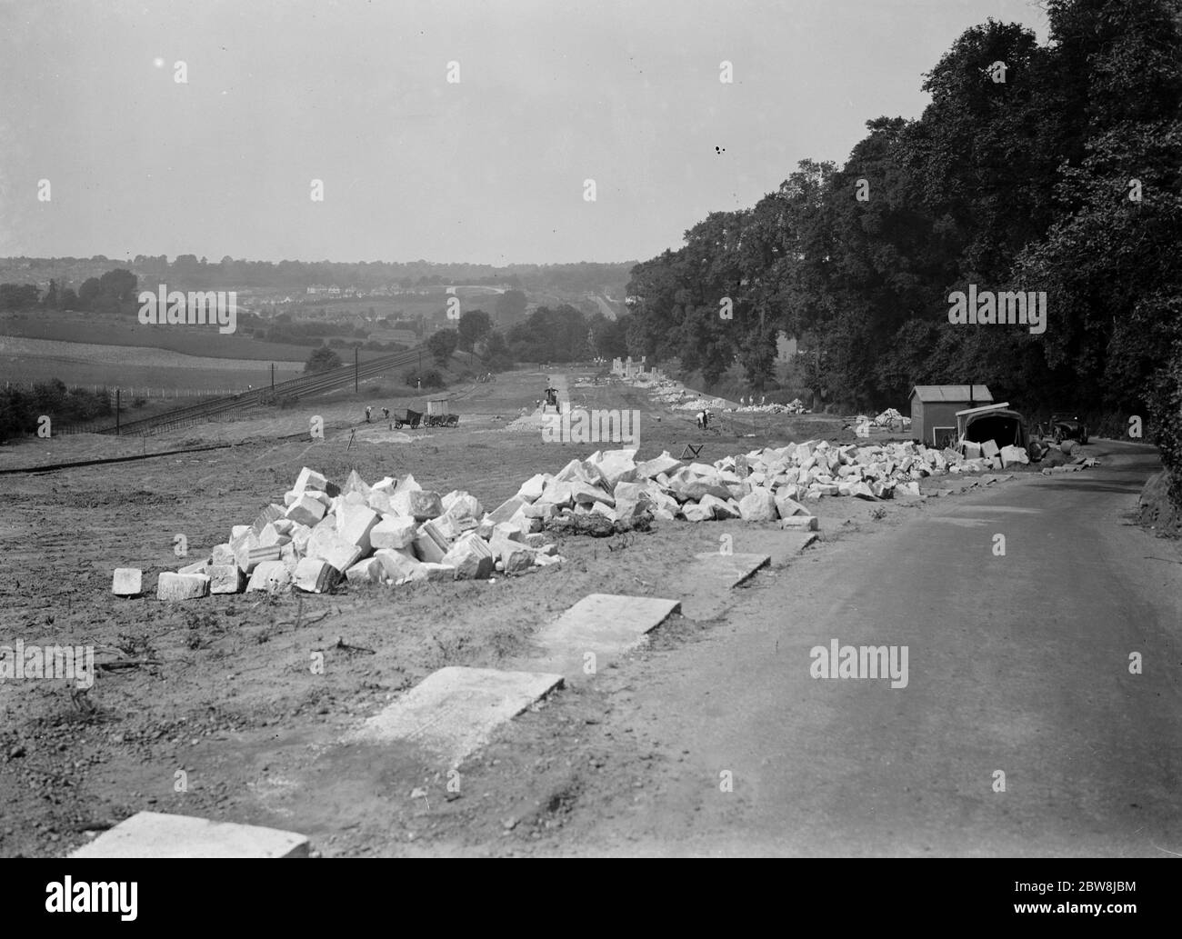 Costruzione di un muro con pietra di Waterloo Bridge . Santa Maria Cray . 1937 Foto Stock