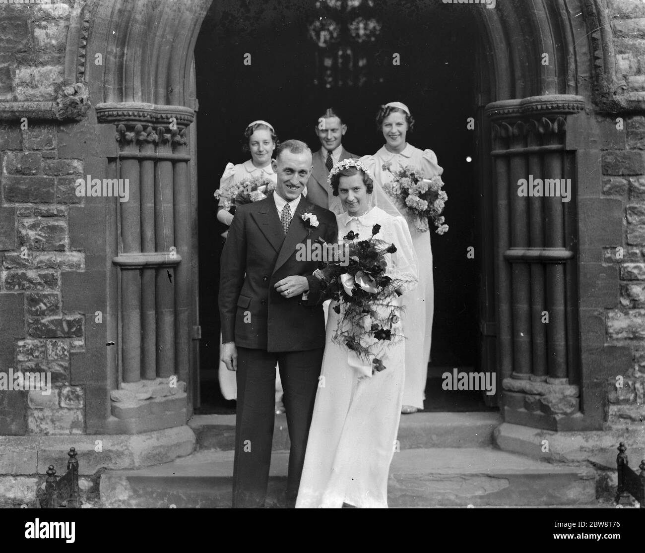 Il matrimonio dei Fairchilds . Una posa con le bridesmaids e il miglior uomo . 1938 Foto Stock