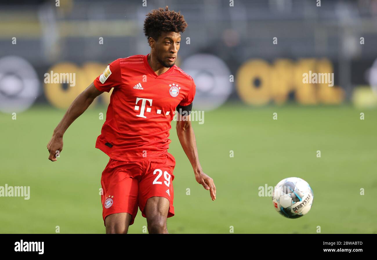 Signal Iduna Park Dortmund Germany, 26.05.2020, Football: Bundesliga Season 2019/20 matchday 28, Borussia Dortmund (BVB, giallo) vs FC Bayern Monaco (FCB, rosso) – Kingsley Coman (FCB) a causa della pandemia del virus Corona, le partite della lega tedesca si svolgono in stadi vuoti senza spettatori. Credit: Jürgen le normative DFL Fromme/firosportphoto/POOL/Kolvenbach vietano l'uso di fotografie come sequenze di immagini e/o quasi-video. Foto Stock