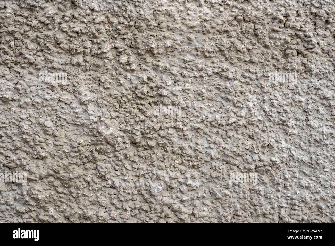 Parete grezza verniciata grigio Foto Stock