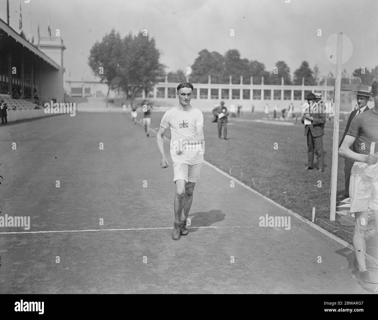 Giochi Olimpici ad Anversa William Hehir (Gran Bretagna) conquista calore 2 dei 10,000 metri a piedi 18 agosto 1920 Foto Stock