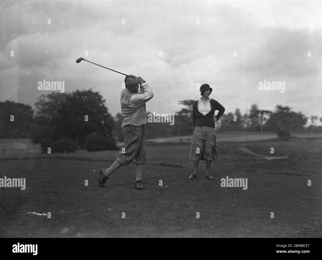 Golf giocatori di tennis prato al Woodcote Park Commander H G Stoker Foto Stock