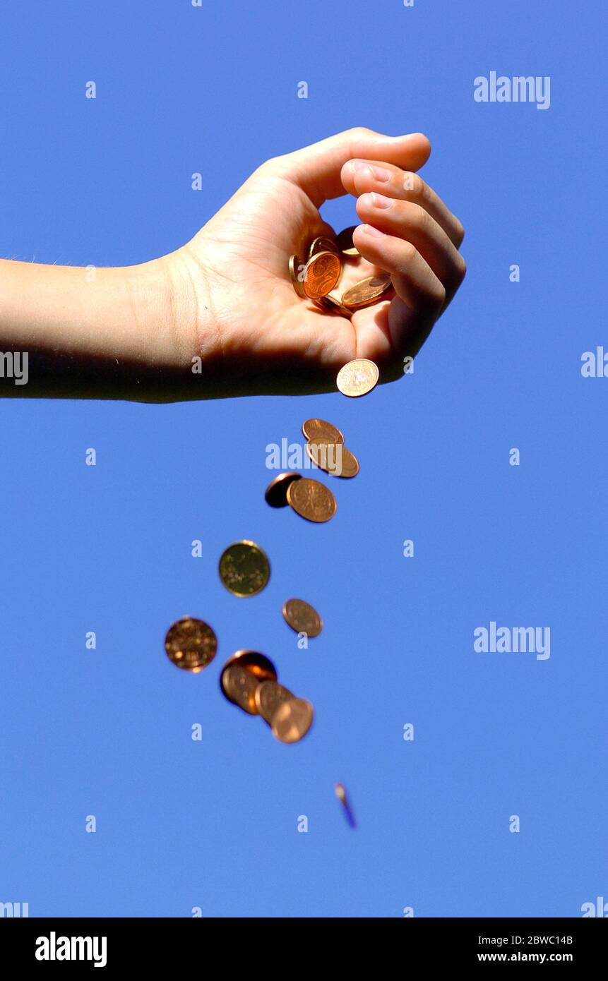 Geldregen, Hand mit gauf-en-en Foto Stock