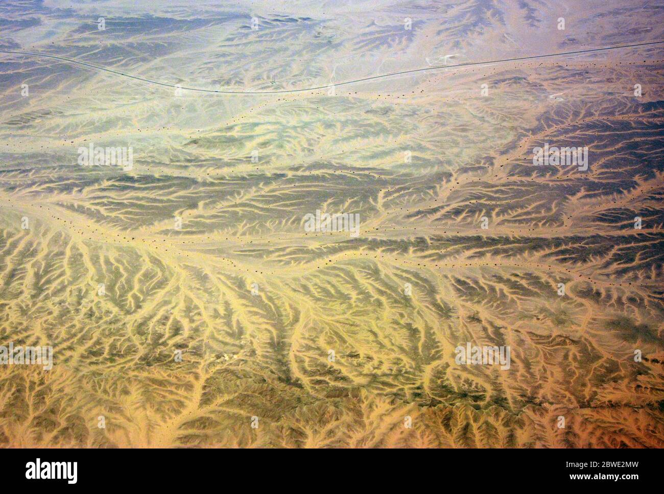 Un modello di ruscelli secchi nel deserto Foto Stock