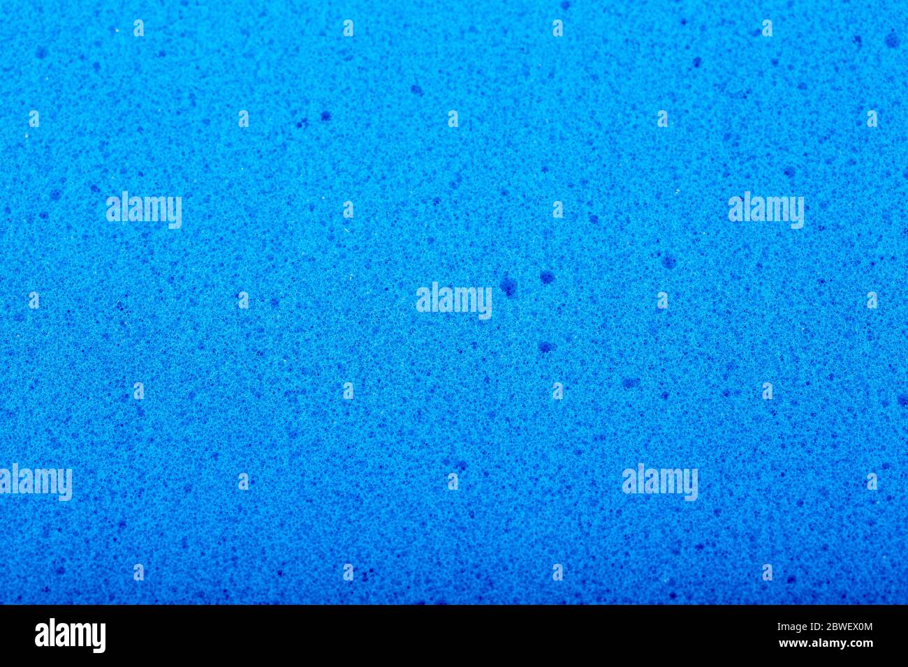 Fondo e texture schiuma blu con effetto memoria per materassi. Foto Stock