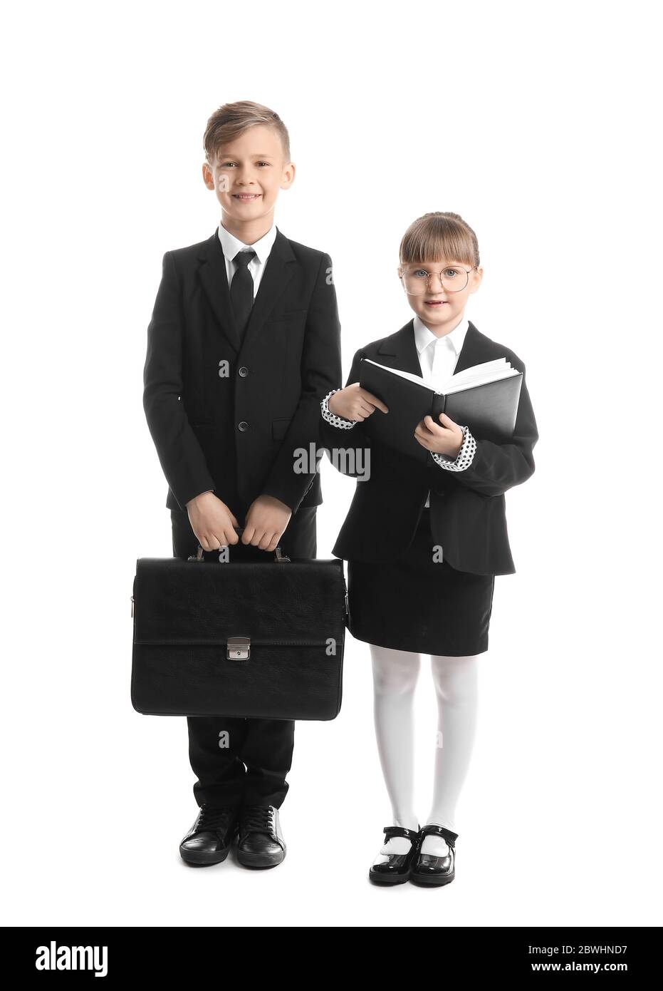 Ritratto di piccoli segretari su sfondo bianco Foto Stock