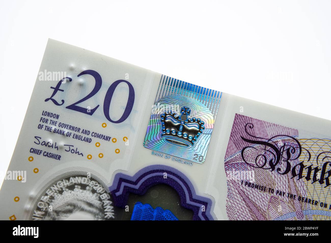 Banconote da 20 sterline. Angolo della pila. Nuovi soldi britannici dei polimeri. Foto macro. Foto Stock