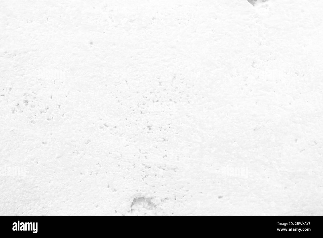 Bianco parete in pietra Texture dello sfondo. Foto Stock