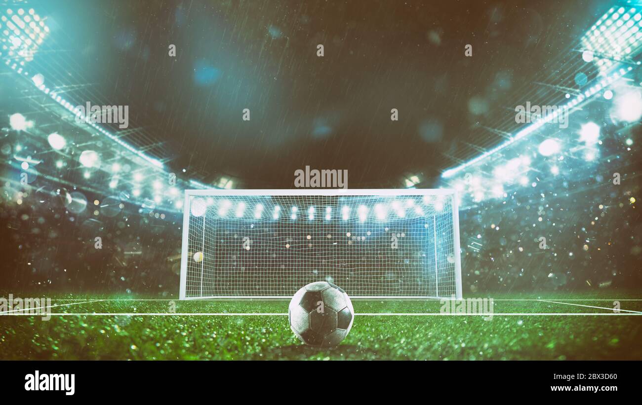 Pronto a calciare la pena e segnare un gol all'interno dell'area dello stadio Foto Stock