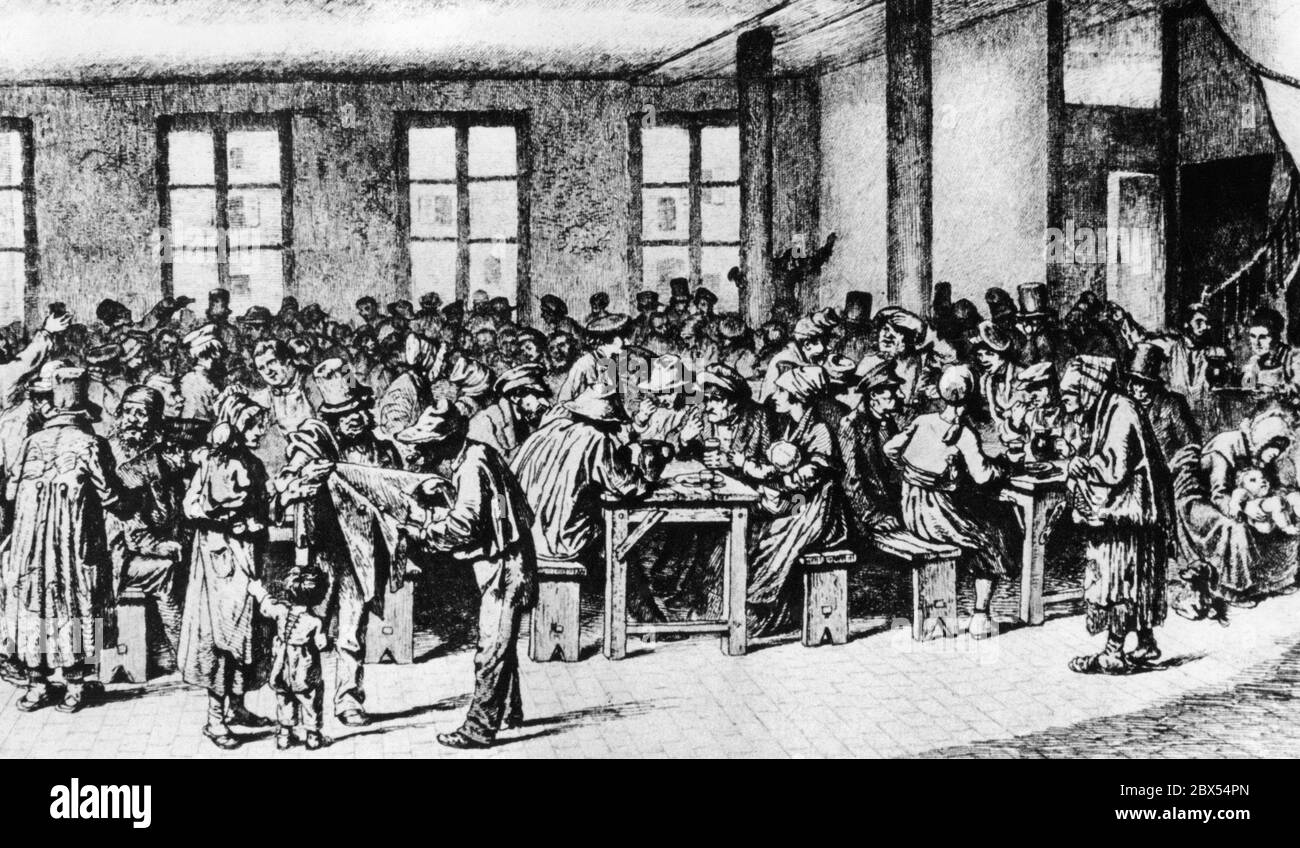 L'interno del pub 'la Californie', frequentato principalmente dalla popolazione povera di Montparnasse. Molte persone poco vestite si siedono insieme su semplici panchine di legno mentre mangiano e bevono. Tra di loro ci sono anche molte donne e bambini. Il pub è composto da una camera singola, semplice, sul lato destro si trova una scala a chiocciola che conduce. Incisione di Flamengo. Foto Stock