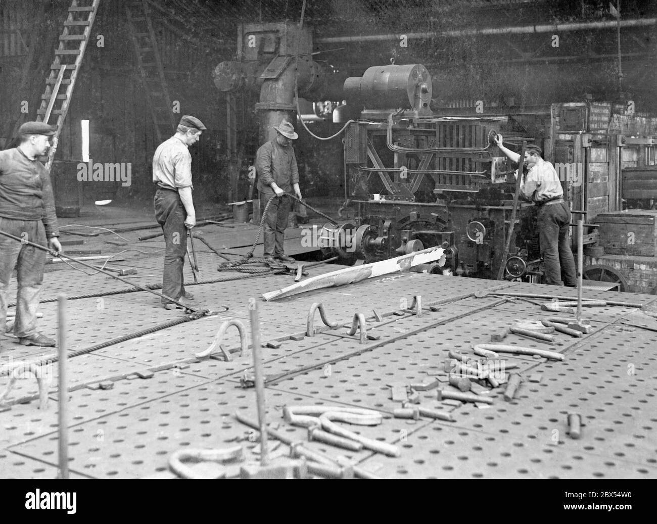 Lavoratori in un cantiere tedesco. Foto Stock