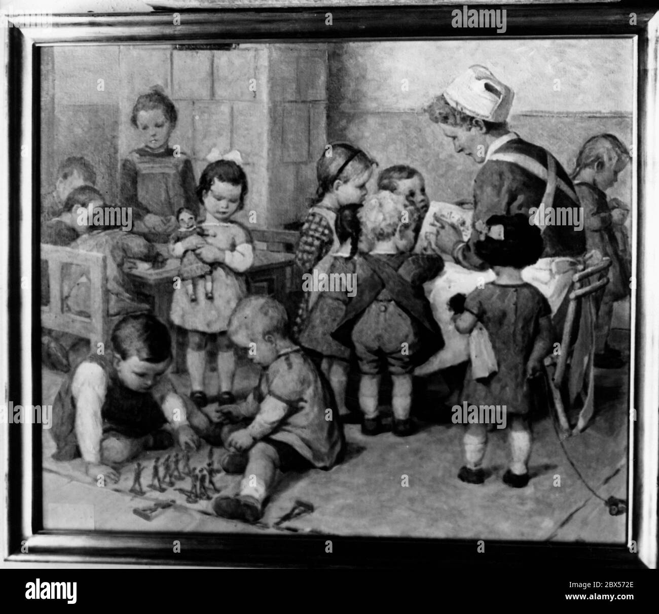 Il dipinto 'im Kinderheim' dell'artista di Bolzano Albert Stolz è presentato al concorso artistico dell'Organizzazione Nazionale Socialista del benessere del Popolo nel Museo Etnologico di Berlino. Foto Stock